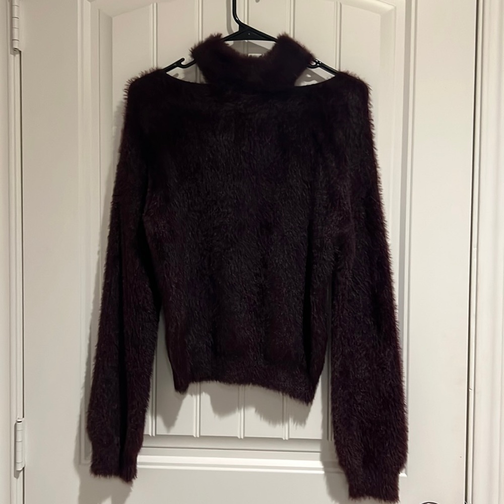 NWOT, never worn purple sweater with open shoulders.